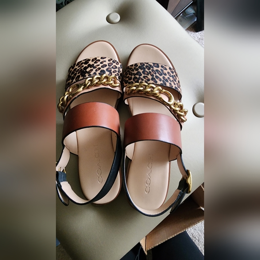 Coach sandals animal print.